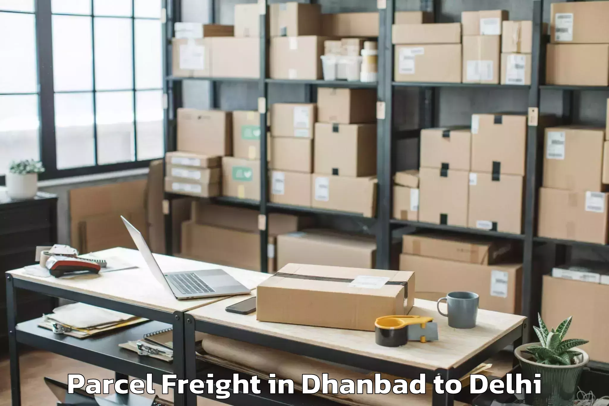 Trusted Dhanbad to Nangloi Jat Parcel Freight